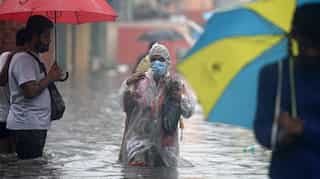 'Rush, save his life at any cost': Lady cop lifts unconscious man, takes him to safety, amid Chennai rains