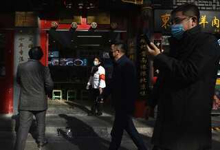 Beijing closes down mall, several housing compounds amid fresh Covid flare-up