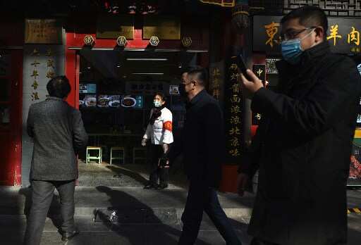 Beijing closes down mall, several housing compounds amid fresh Covid flare-up