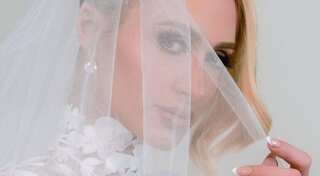 Paris Hilton stuns as a bride: Heiress marries Carter Reum in a star-studded ceremony