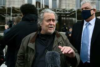 Trump's ex-adviser Steve Bannon surrenders to face Capitol riots probe