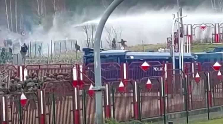 Polish forces use tear gas, water cannons on migrants at border