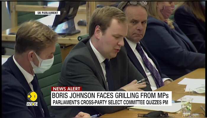 Fiery session in UK parliament, no easy exit from sleaze row for Boris Johnson