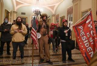 Judge sentences US Capitol rioter 'QAnon Shaman' to over three years in prison