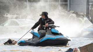 To rescue cows, farmers use boats, jet skis as floods wreak havoc in Canada's British Columbia