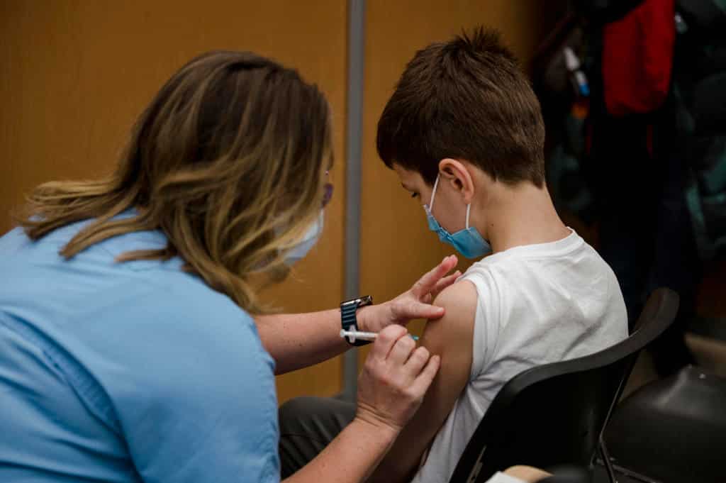 Portugal, France begin vaccinating younger children