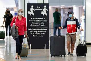 WHO urges countries to lift travel bans and not ask for vaccination proof for entry