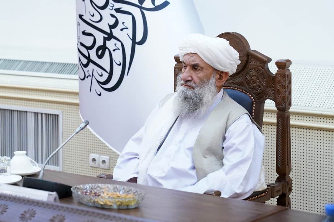 Afghanistan's PM urges charities to keep offering aid as nation battles poverty Afghanistan's PM urges charities to keep offering aid as nation battles poverty