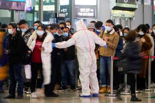 China's CDC says there would 630,000 daily COVID-19 cases if it follows 'US-style' method