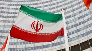 UN nuclear watchdog chief in Tehran for talks as UK says deal 'close'