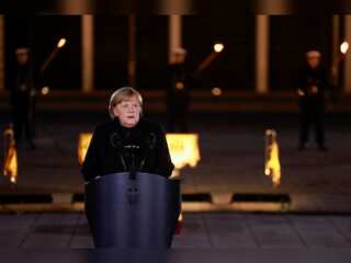 In Pics | With punk, torches and hymn, German military bids farewell to Angela Merkel at 'Grand Tattoo'