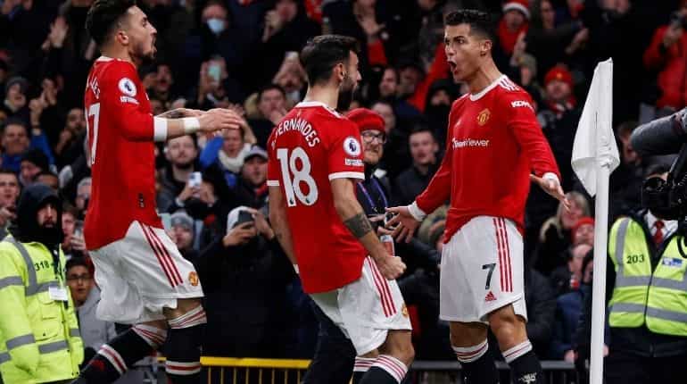 Cristiano Ronaldo scores a double to surpass 800-goal mark as Manchester United beat Arsenal 3-2