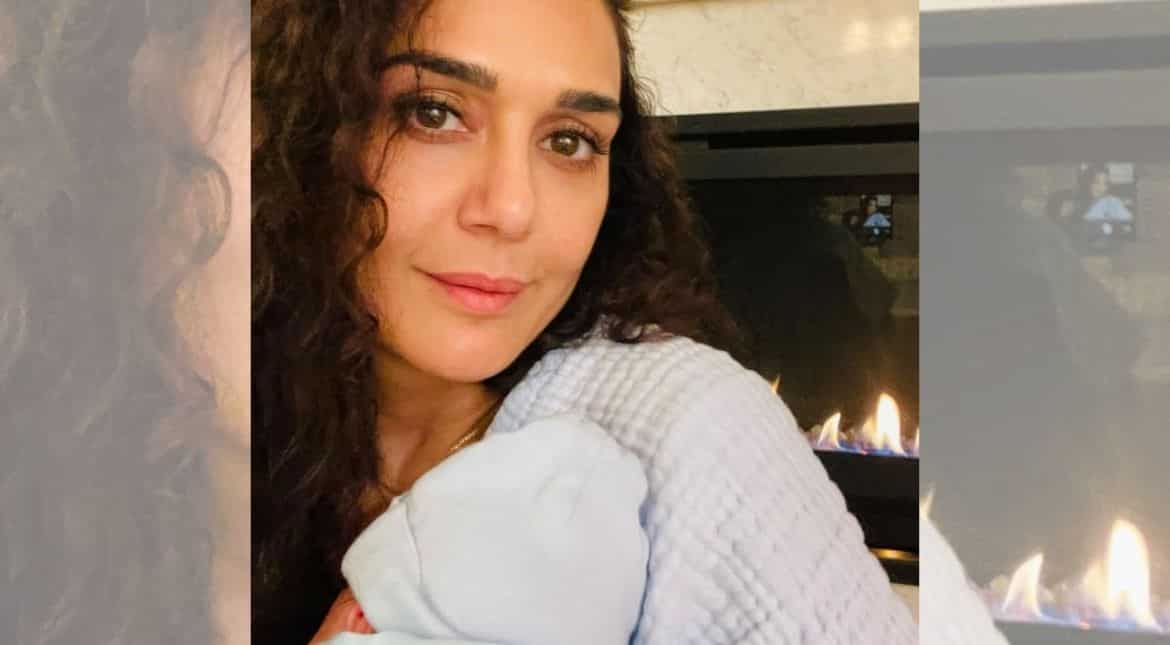 Preity Zinta shares pic with newborn, says she's loving 'burp cloths, diapers' Preity Zinta shares pic with newborn, says she's loving 'burp cloths, diapers'