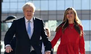 After Boris Johnson, his wife pictured breaking COVID-19 rules, hugging friend - see pic