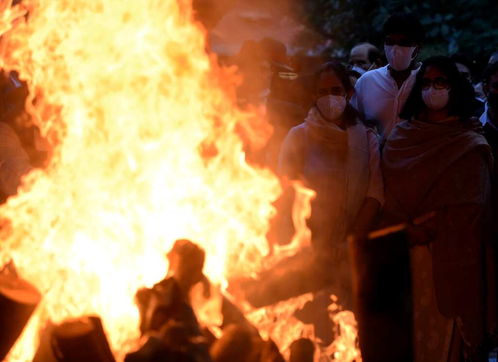 Mortal remains of Gen Rawat, his wife consigned to flames after 17-gun salute