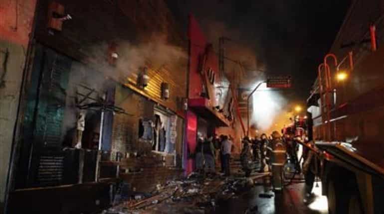 'Possible criminal intent': Brazil court charges four for Brazil disco fire that killed 242