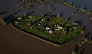 First fires, then floods: Climate extremes batter Australia