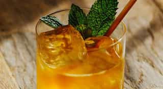 An encyclopedic new guide to cocktails stirred, shaken, rolled, tossed, swizzled, muddled