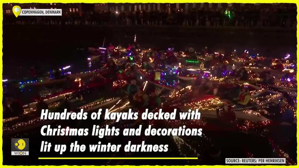 Decorated canoes light up Copenhagen canals for christmas