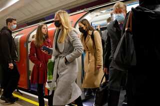 Omicron cases may reach parity with Delta by mid-December: UK health agency