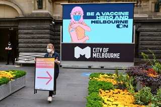 Australia allows vaccinated non-citizens to enter amid Omicron threat