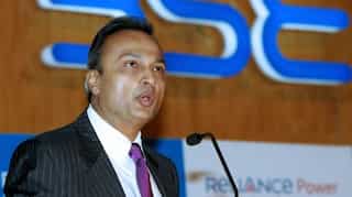Reliance power settles outstanding loans, shares jump