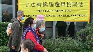 As Hong Kong begins voting on China's blueprint, locals skip 'undemocratic' process