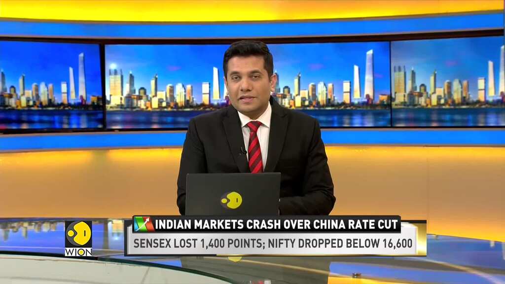 Asian stock markets trade in deep red after China slashes its benchmark lending rate