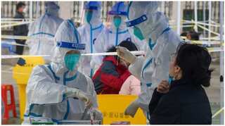 Chinese city battles twin threats of Covid and haemorrhagic fever