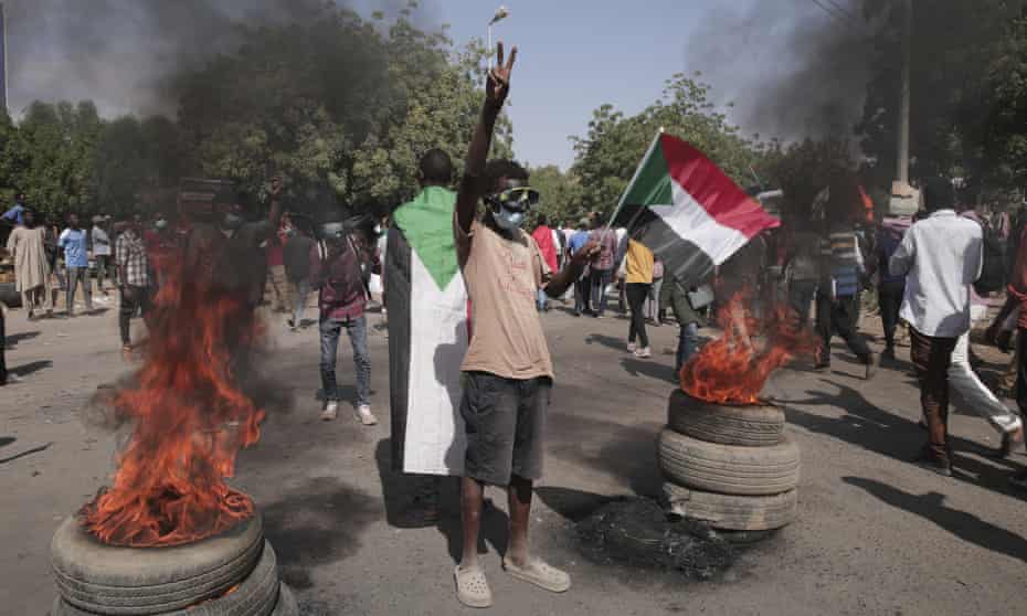 Mass anti-coup protests turn violent in Sudan as thousands march to Presidential palace