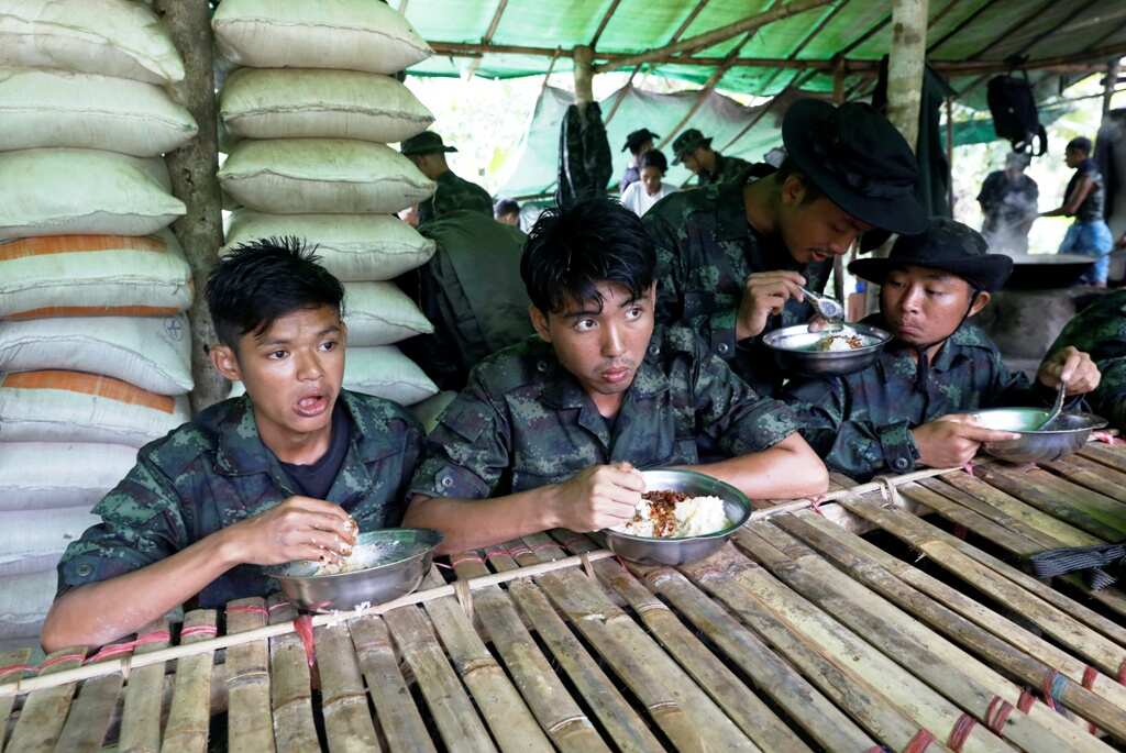 Myanmar: Young citizens train to battle in a makeshift camp in deep forest against Military