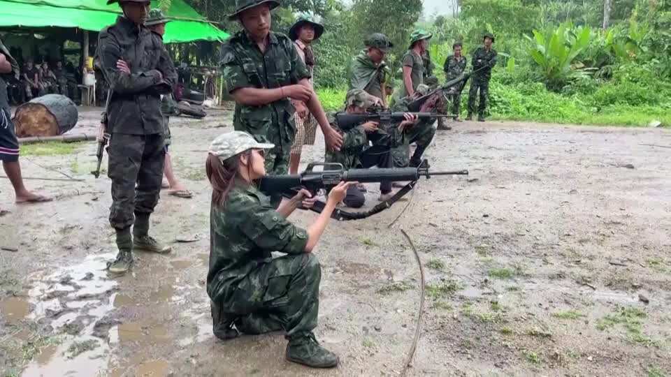 Myanmar: Young civilians prepare to fight military in a makeshift camp in deep forest