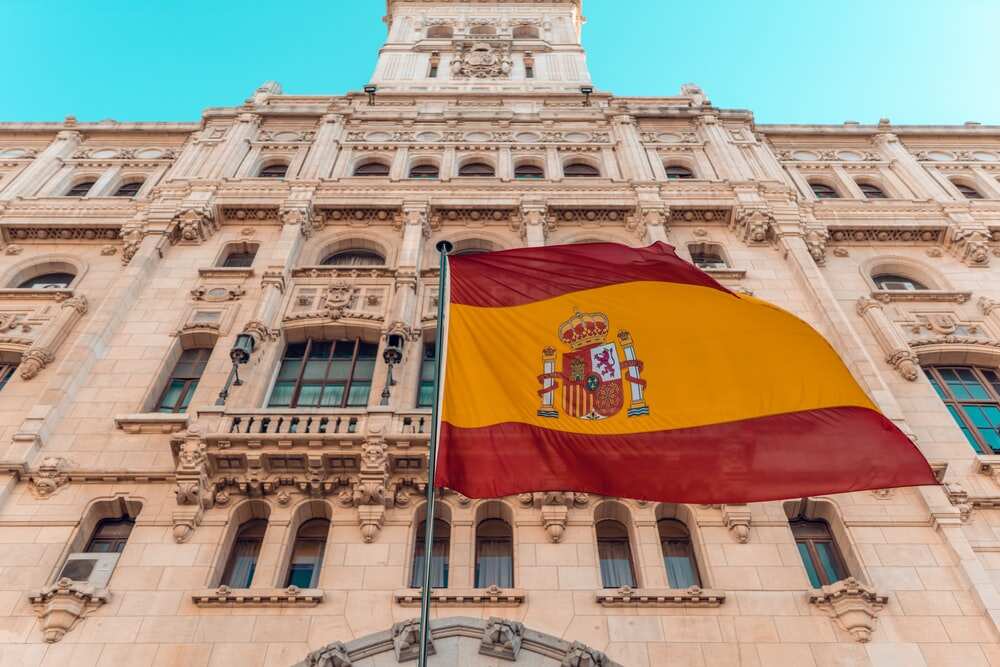 Hundreds of protesters march through central Barcelona against the new holiday restrictions