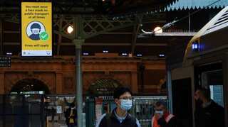 NSW reports first Omicron death as Australia sees 10,000 Covid cases for first time
