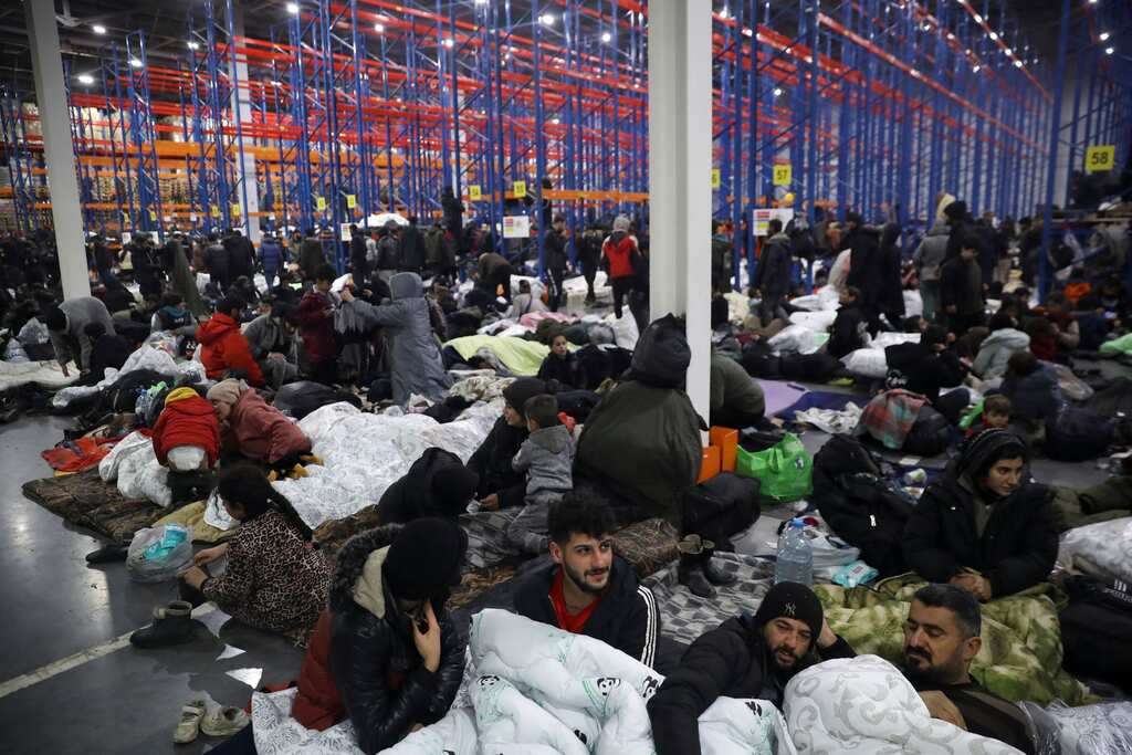 Migrants camped in Belarus warehouse still hope of a future in European Union