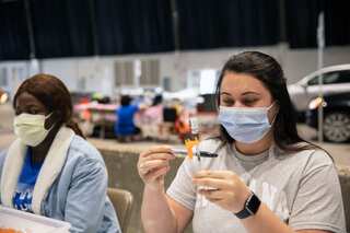 Where vaccination rates are low in US, reasons vary