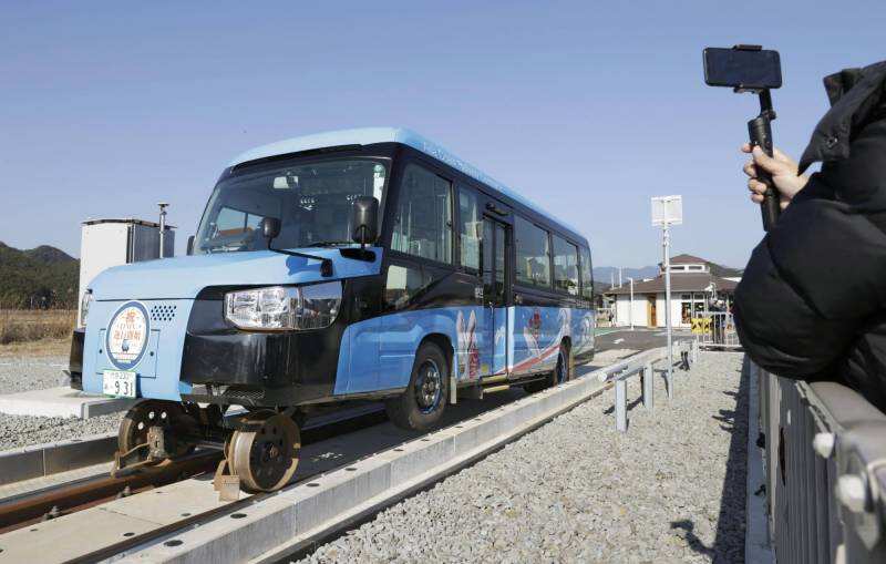 Japan to roll out vehicle that can run on roads, railway tracks