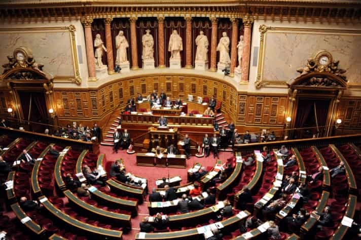 French MPs debate 'COVID-19 vaccine pass' bill, denounce death threats