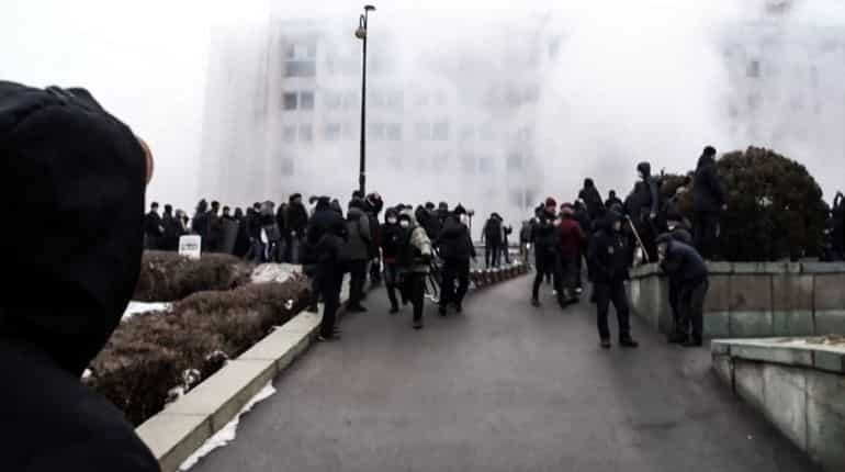 Those who don't shun violence will be killed, says Kazakh govt as 18 troops die
