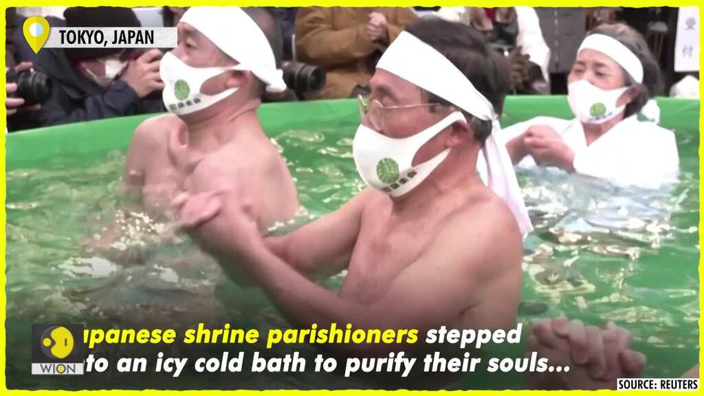 Japanese shrine parishioners dip into icy bath for annual Shinto ritual
