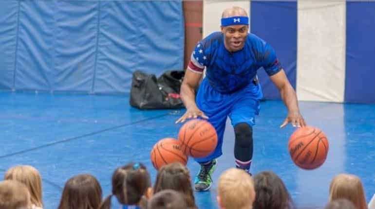 Watch: Corey the Dribbler creates world record by bouncing four basketballs 326 times in 30 seconds