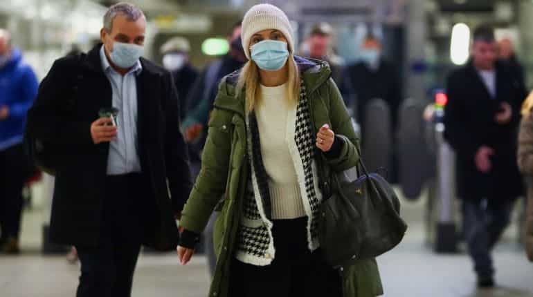 CDC to significantly ease pandemic mask guidelines Friday - World News