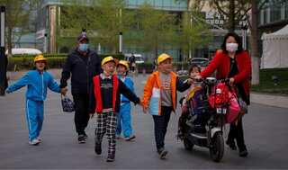 China's population grows but birth rate drops to record low in 2021