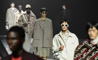 Sidewalk is new catwalk outside Milan fashion shows