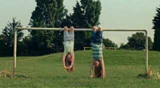 UK bans ad showing girl eating cheese while hanging upside down