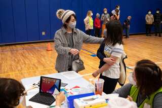 Booster shots are instrumental in fighting Omicron, CDC data show