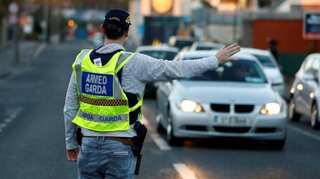 Two men take dead body to post office in Ireland. Find out why