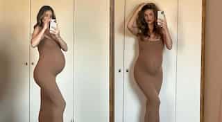 Rosie Huntington-Whiteley stuns in skin-tight dress as she flaunts baby bump