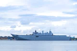 Australian warship carrying humanitarian assistance hit with virus