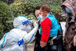 Amid Delta outbreak, Chinese authorities lock down communities near Beijing's neighbouring city